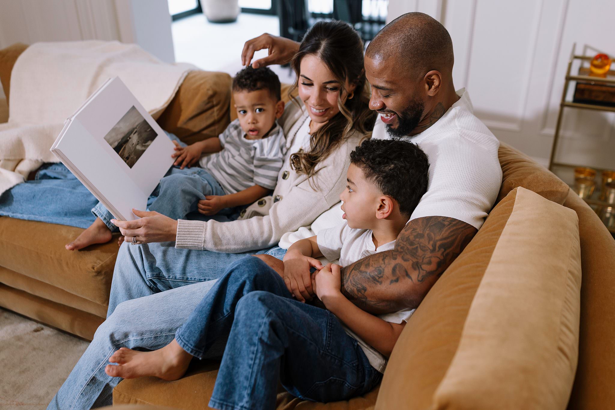 A family reading a Hardcover Book together