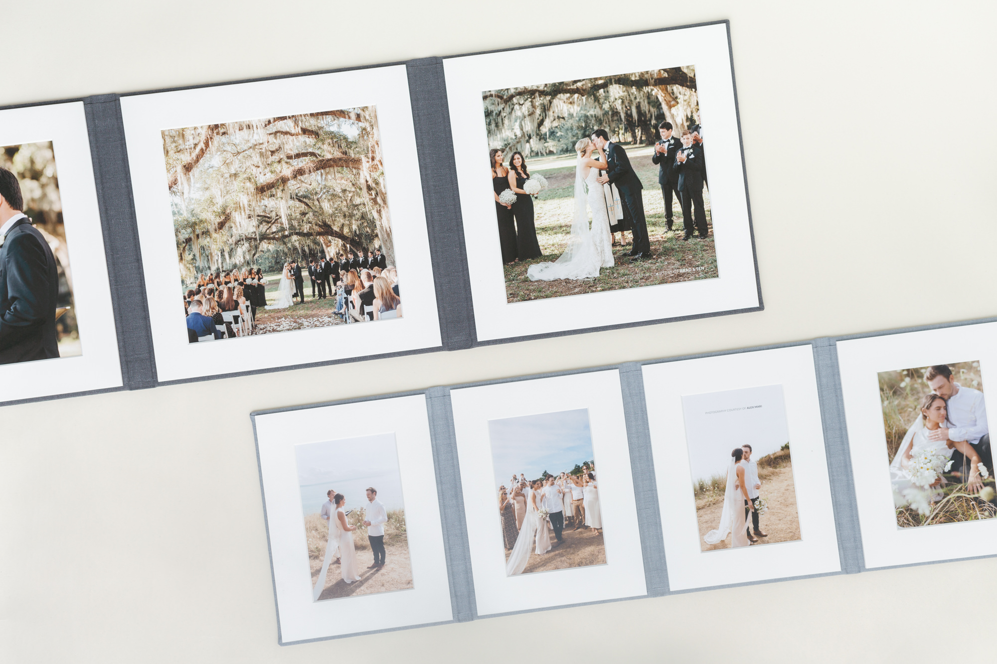 A tri-fold and a quad-fold matted folio laid open to reveal a sequence of wedding prints